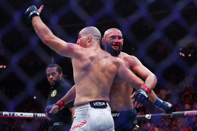 Sean Strickland and Khamzat Chimaev embrace after UFC 328 fight