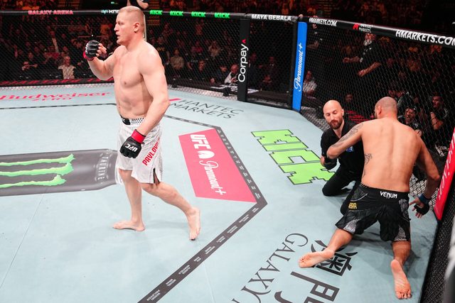 Sergei Pavlovich celebrates after knocking out Tallison Teixeira in their fight 